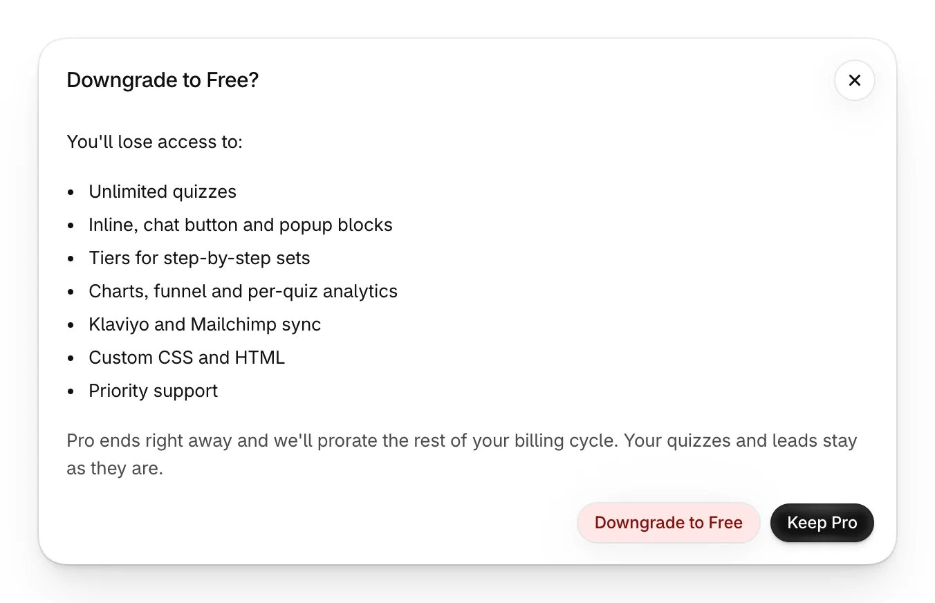 Downgrade to Free?, listing the Pro features you'd lose, with Downgrade to Free and Keep Pro